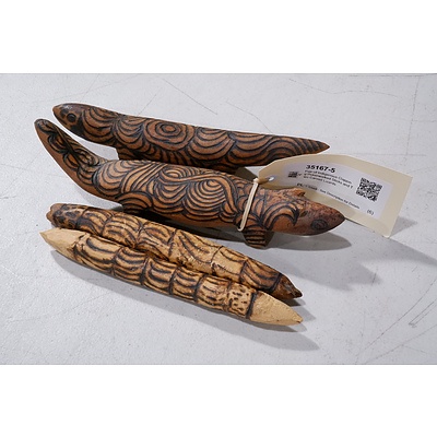 Pair of Indigenous Clapping Pokerworked Sticks and Two Carved Lizards