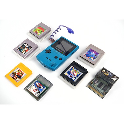 Vintage Nintendo GameBoy Color with Seven Game Cartridges