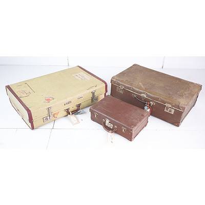 Two Vintage Suitcases with Travel Stickers and a Child's School Case