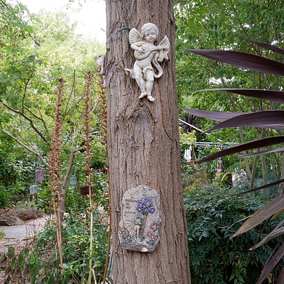 Two Composite Cherubs and a Composite 'Welcome to my Garden' Sign
