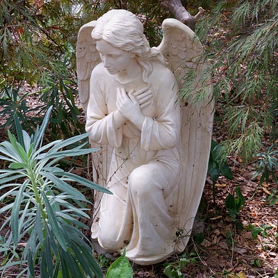Cast Composite Figure of a Kneeling Angel