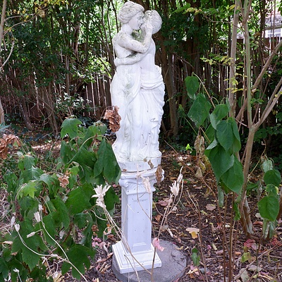 Cast Composite Figural Group of a Couple Kissing with Pedestal