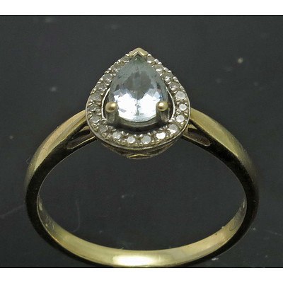 9ct Gold Natural Aquamarine Ring With Diamond-Set Halo