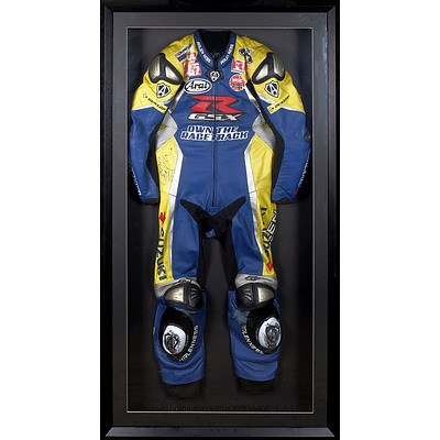 Suzuki Professional Motorcycle Racing Suit in Large Shadowbox Frame - Indistinctly Signed 2012