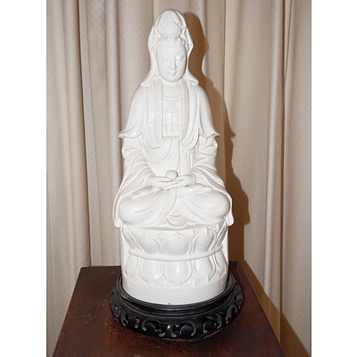 Chinese Blanc De Chine Figure of Guanyin Seated on a Lotus Base