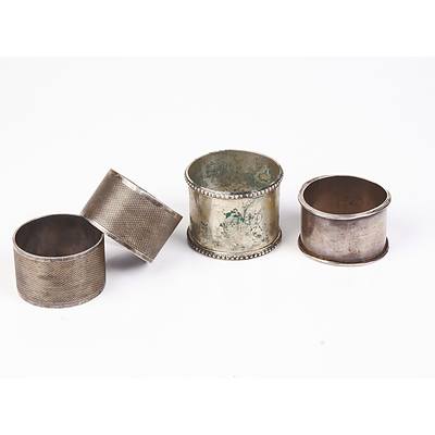 Sterling Silver Napkin Ring and Three Silver Plated Napkin Rings