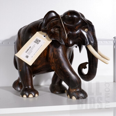 Hand Carved Maccasar Ebony Elephant with Bone Tusks and Toenails
