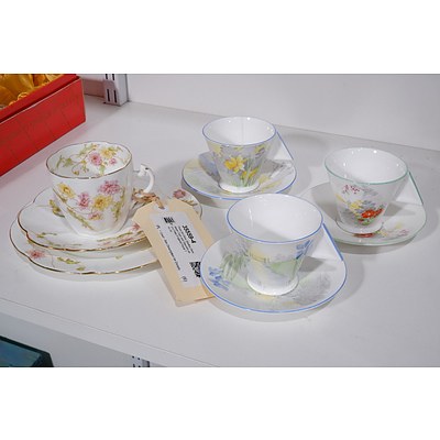 Three Art Deco Shelley Demitasse Cups and Saucers and a Foley England Floral Trio (4)