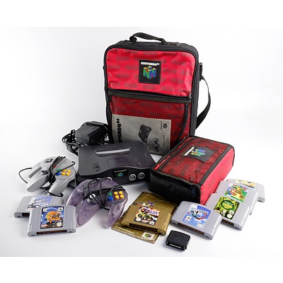 Nintendo 64 in Carry case with two Controllers, Manual, Extra Ram and Seven Games