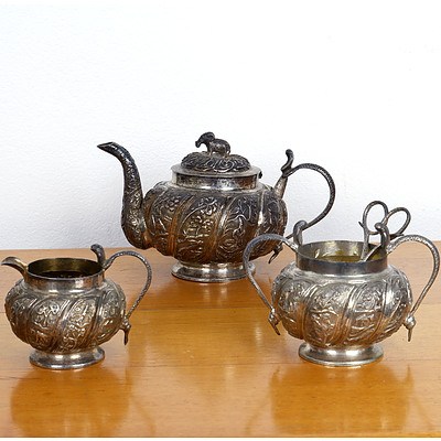 Indian Lucknow .800 Silver Heavily Repousse Three Piece Tea Service with Elephant and Cobra Finial and Peacock Mark, 844g