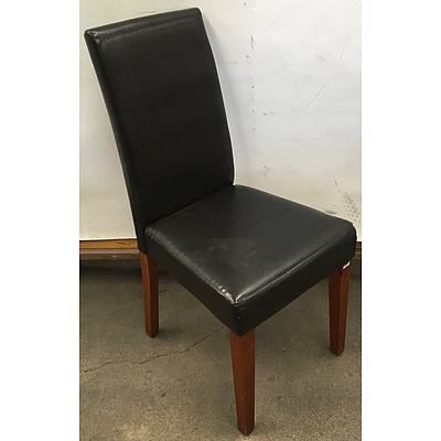 2 Dark Brown Faux Leather Dining Chairs And A Black Faux Leather Club Chair