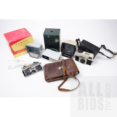 Vintage Kodak Instamatic 25 Camera, Brownie Camera, Two Slide Viewers, Leather Camera Case, Sports Binoculars, and a Flash Unit