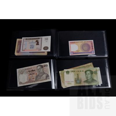Two Banknote Books with International Banknotes From: Brazil, Peru, China and More