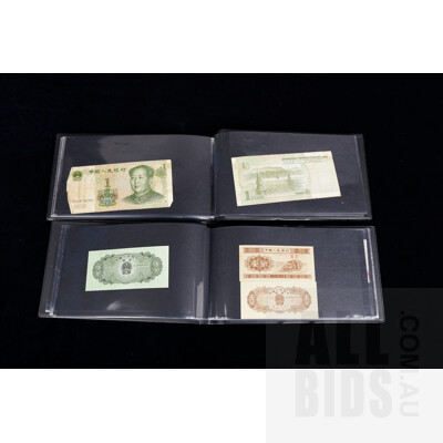 Two Banknote Books with International Banknotes From: Brazil, Peru, China and More