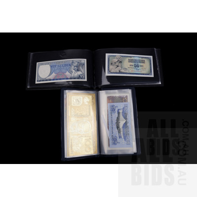 Two Banknote Books with International Banknotes From: Korea, United States, Japan, Argentina and More