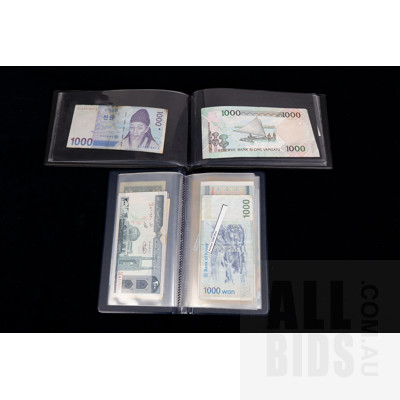 Two Banknote Books with International Banknotes From: Korea, United States, Japan, Argentina and More