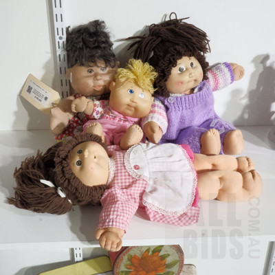 Four Collectible Cabbage Patch Dolls including Two 1980s - All Marked to Back