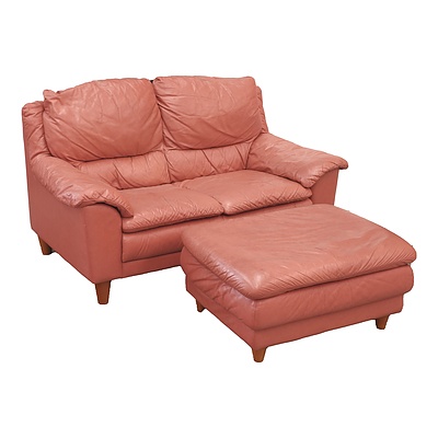 Italian Natuzzi Salmon Colored Leather Two Seater lounge with Matching Foot Stool