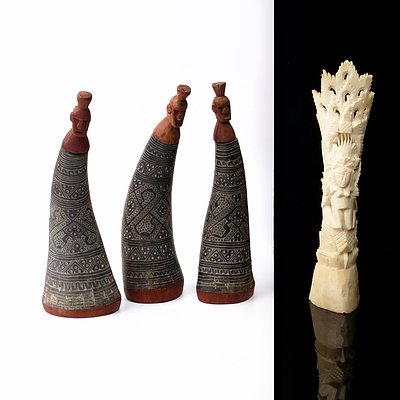 Three Vintage Carved Horn and Wood Tribal Figures and an Eastern Carved Bone figure (4)