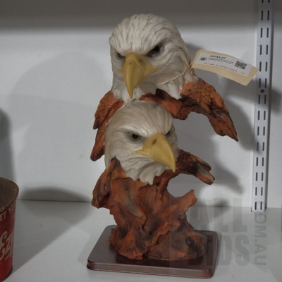Resin Figurine of Two Eagle Heads Carved into Log