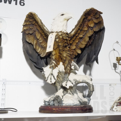 Large Resin Figurine of an Eagle on Wooden Stand