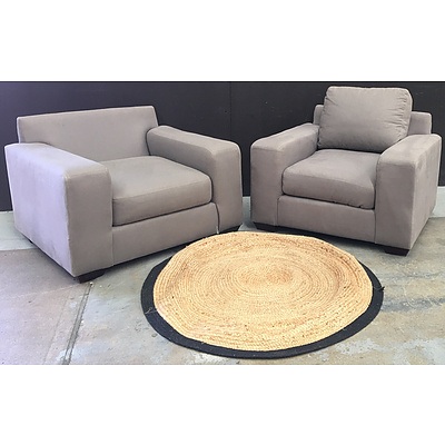 Two Light Brown Fabric Arm Chairs And A Round Jute Rug