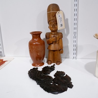 Carved Teak Soldier Figure, Thai Rosewood Plaque and a Patterned Eastern Pottery Vase (3)