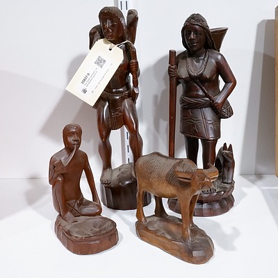 Four South East Asian  Carved Wooden Figures (4)