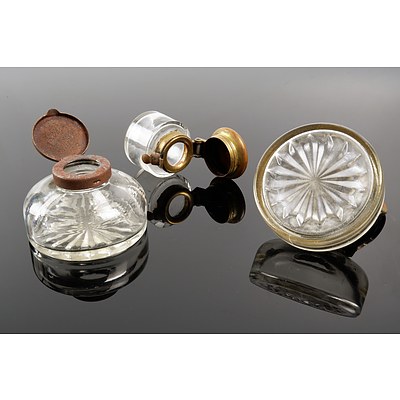 Two Round Bulbous Glass Ink Pots with Silverplate Lids and an Antique Moulded Glass Ink Pot with Brass Lid Inset with Stone (3)