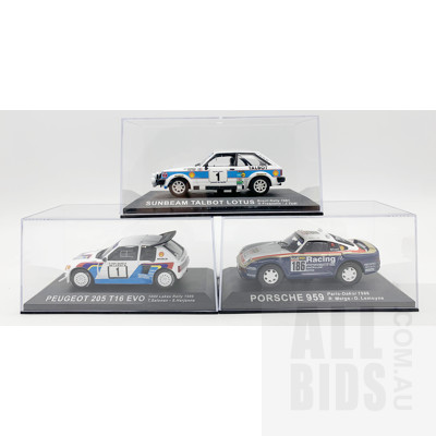 Three 1:43 Scale Diecast Model Cars in Display Boxes