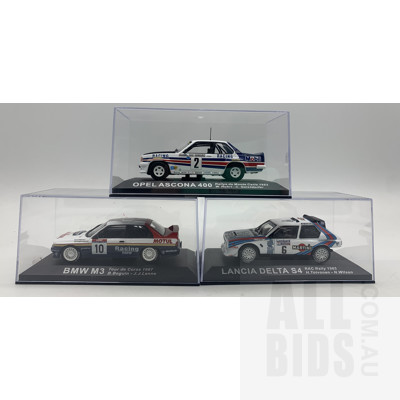 Three 1:43 Scale Diecast Model Cars in Display Boxes
