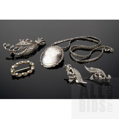 .800 Silver and Tahetian Shell Cameo Pendant, Marcasite Lily of the Valley Brooch with Matching Earrings, and a Silver and Faux Pearl Brooch 
