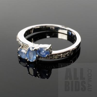 Sterling Silver Ring with Three Pale Blue Celanese Type Sapphires and Single Cut Diamonds, 