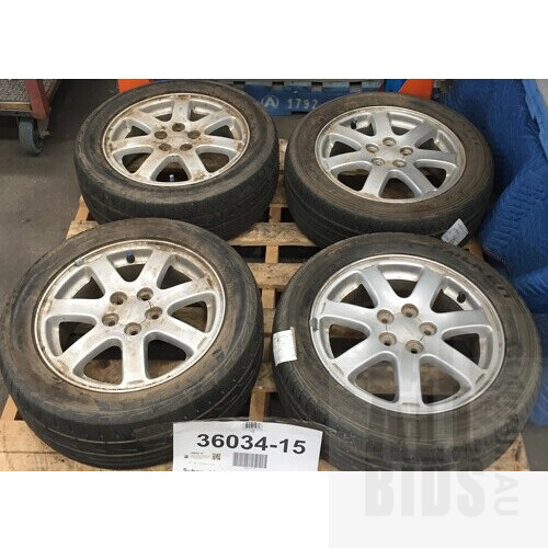 Set Of 4 Subaru Wheels With Falken Ziex And Bridgestone Potenza Tyres