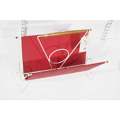 Mid Century Magazine Rack with Textured Vinyl Red Cover Over Metal Frame and Wooden Handle