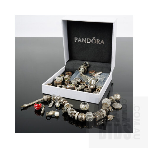 Sterling Silver Bracelet with Various Charms Including Pandora, and a Skeleton Head Pendant