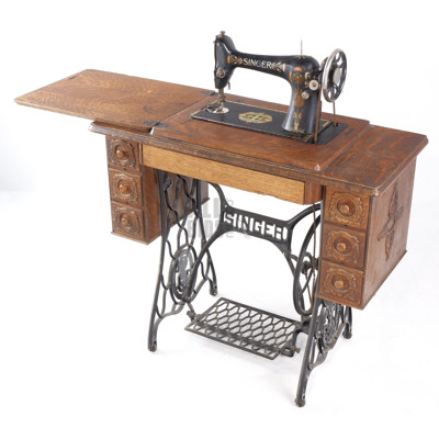 Vintage Singer Treadle sewing Machine with Cast Iron Base and Oak Cabinet