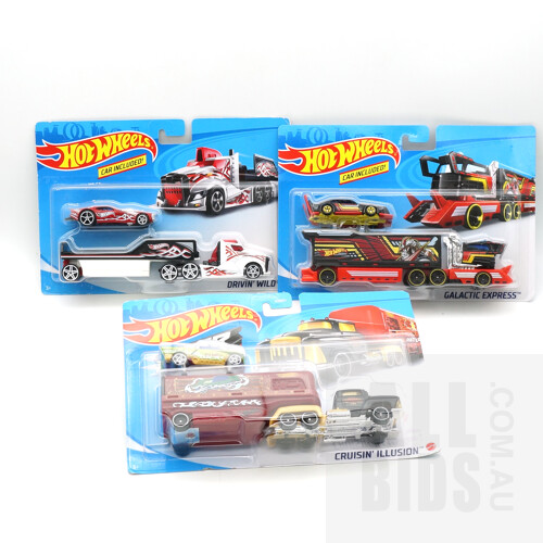 Three Boxed Hot Wheels Super Rigs, Including Galactic Express, Cruising Illusion and Drivin Wild