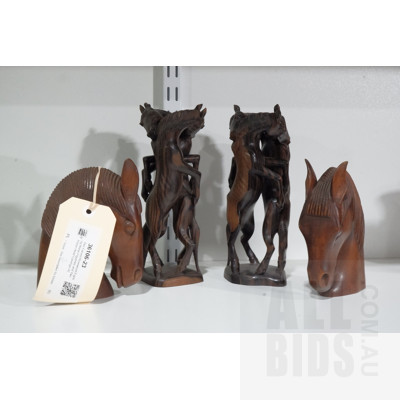 Two Carved Rosewood Fighting Horse Figurines and Two Horse Head Carvings (4)