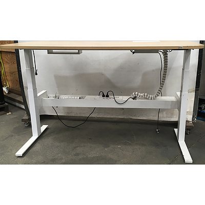 Sit And Stand Desk With Computer Cable Channels And Power Outlets