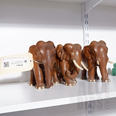 Three Carved Teak Elephant Figurines with Bone Tusks and Toenails (3)