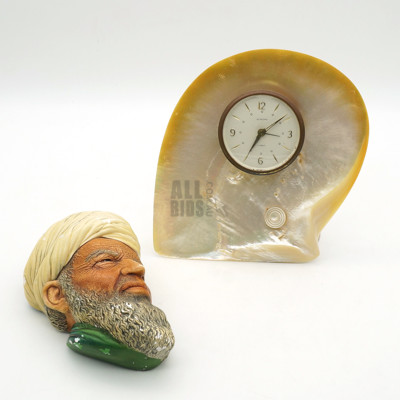 Vintage Europa 2 Jewel Clock on Shell Stand with a Vintage Bossons Chalkware Figure Circa 1959