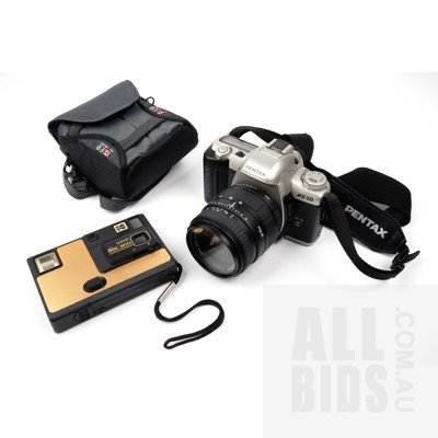 Pentax MZ-50 SLR Camera with 28-70mm Lens and a Kodak 3100 Disc Camera