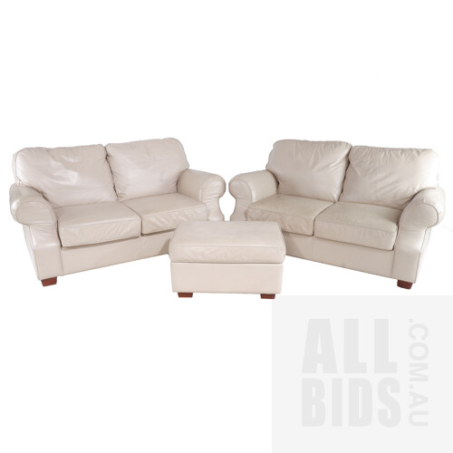 Two Moran Beige Leather Upholstered Two-Seater Lounges with Matching Footrest