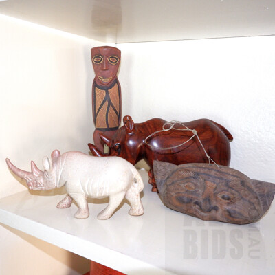 Tiwi Islands Carved and Ochre Painted Figure, Carved Stone and Hardwood Rhinoceros and Vintage Macassar Ebony Bell