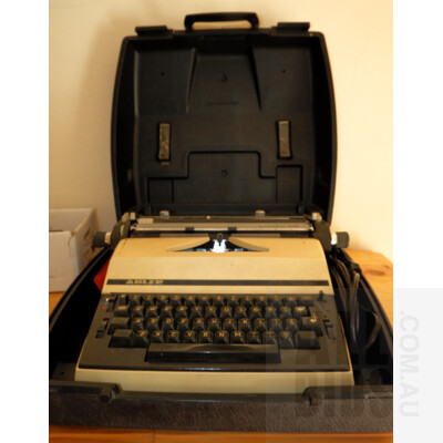 Three Vintage Typewriters Including Adler, Olympia and Another