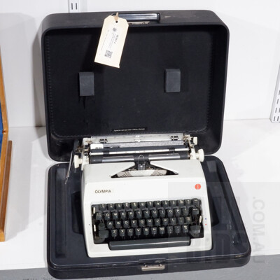 Vintage Olympia Portable Typewriter with Original Case