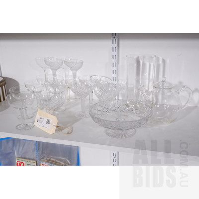 Collection Quality Stemware and Glassware Including Nine Hollow Stem Champagne Glasses, Five Crystal Champagne Glasses, Boda Design Vase and More