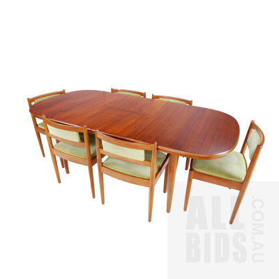 Retro Teak Butterfly Extension Dining Table with a Set of Six Fabric Upholstered Chairs