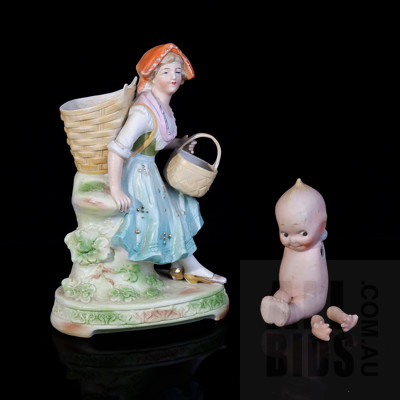 Antique Continental Bisque Porcelain Figurine of Young Lady Carrying Baskets and Bisque Kewpie Doll with Separate Arms